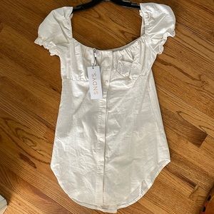 Super cute milkmaid style blouse! Sooo unique and sweet with jeans!